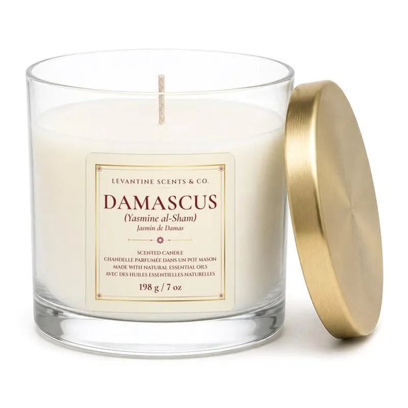 Damascus 'Yasmine al-Sham' 198 g / 7 oz hand-poured coconut apricot wax candle in a clear jar with gold lid